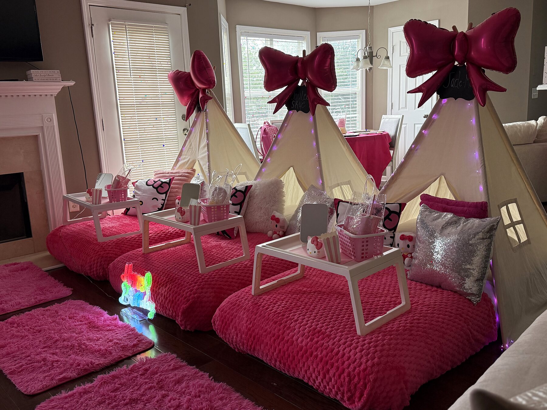 Latest Atlanta sleepover: a Hello Kitty-inspired pink bow teepee party with three coordinated beds