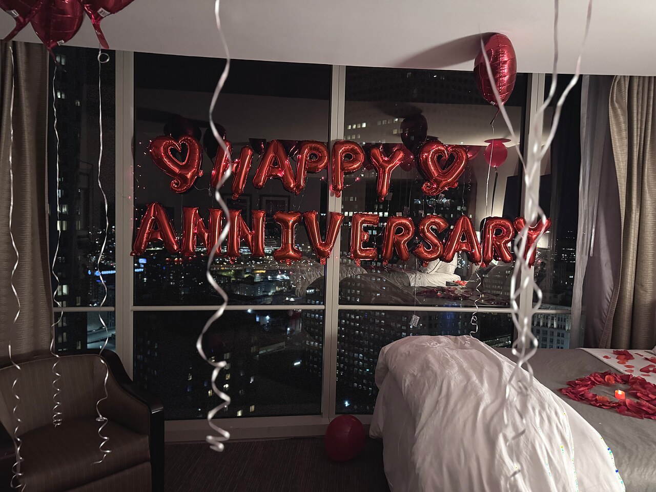 Happy Anniversary balloon message overlooking the Atlanta skyline